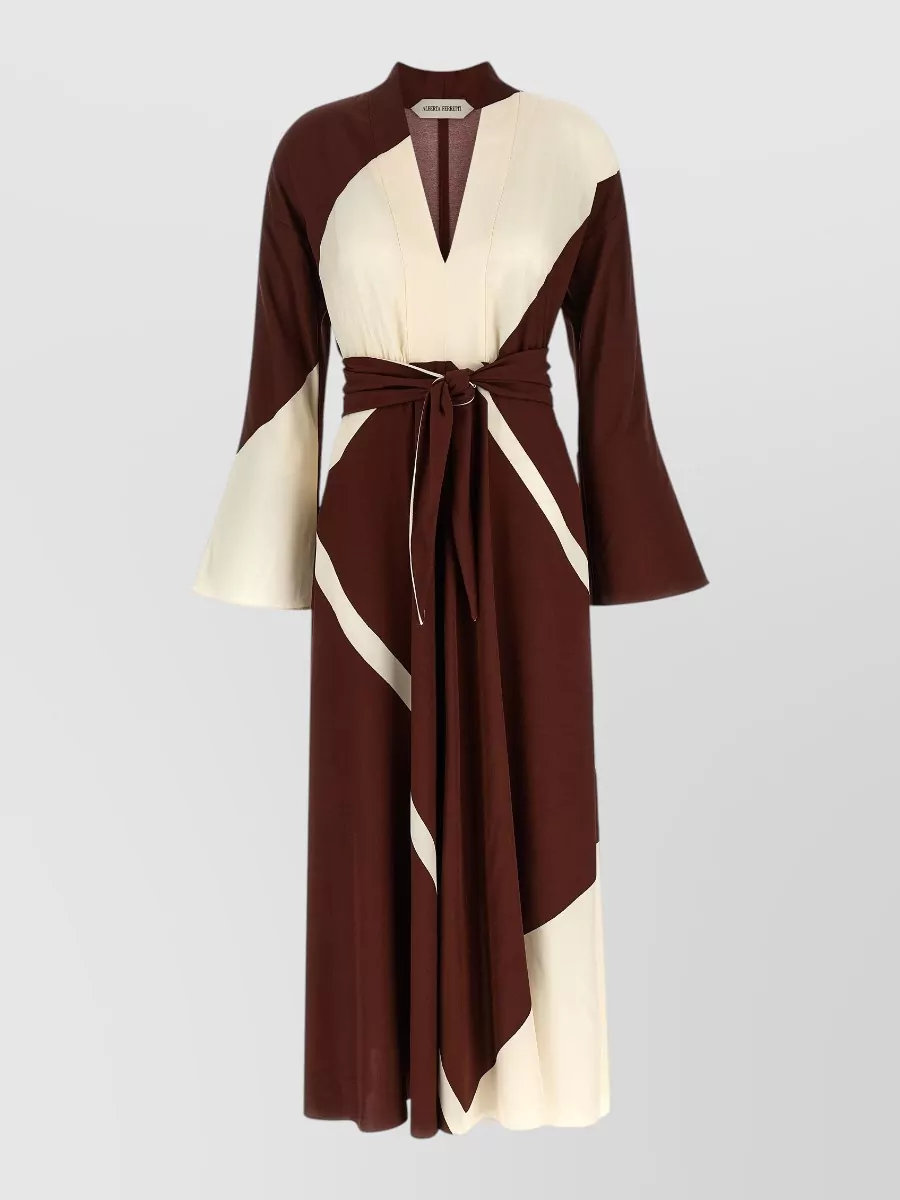 Alberta Ferretti Printed v-neck long-sleeve maxi dress — The sand-gold caftan’s fluid, boho-quiet-luxury mood harmonizes with the fringed Alanui cardigan without competing prints, creating a clean column under the graphic knit.