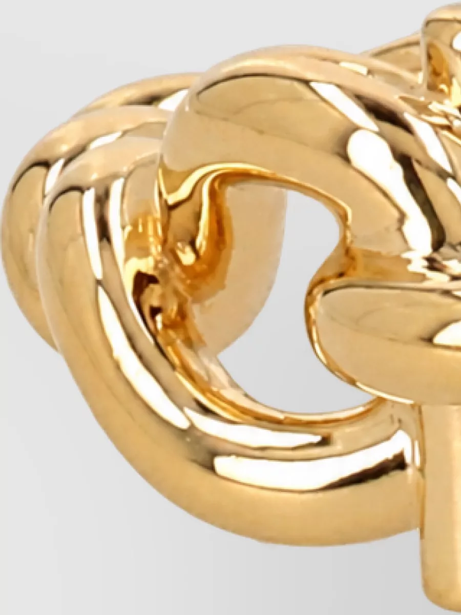 Ferragamo brass brooch