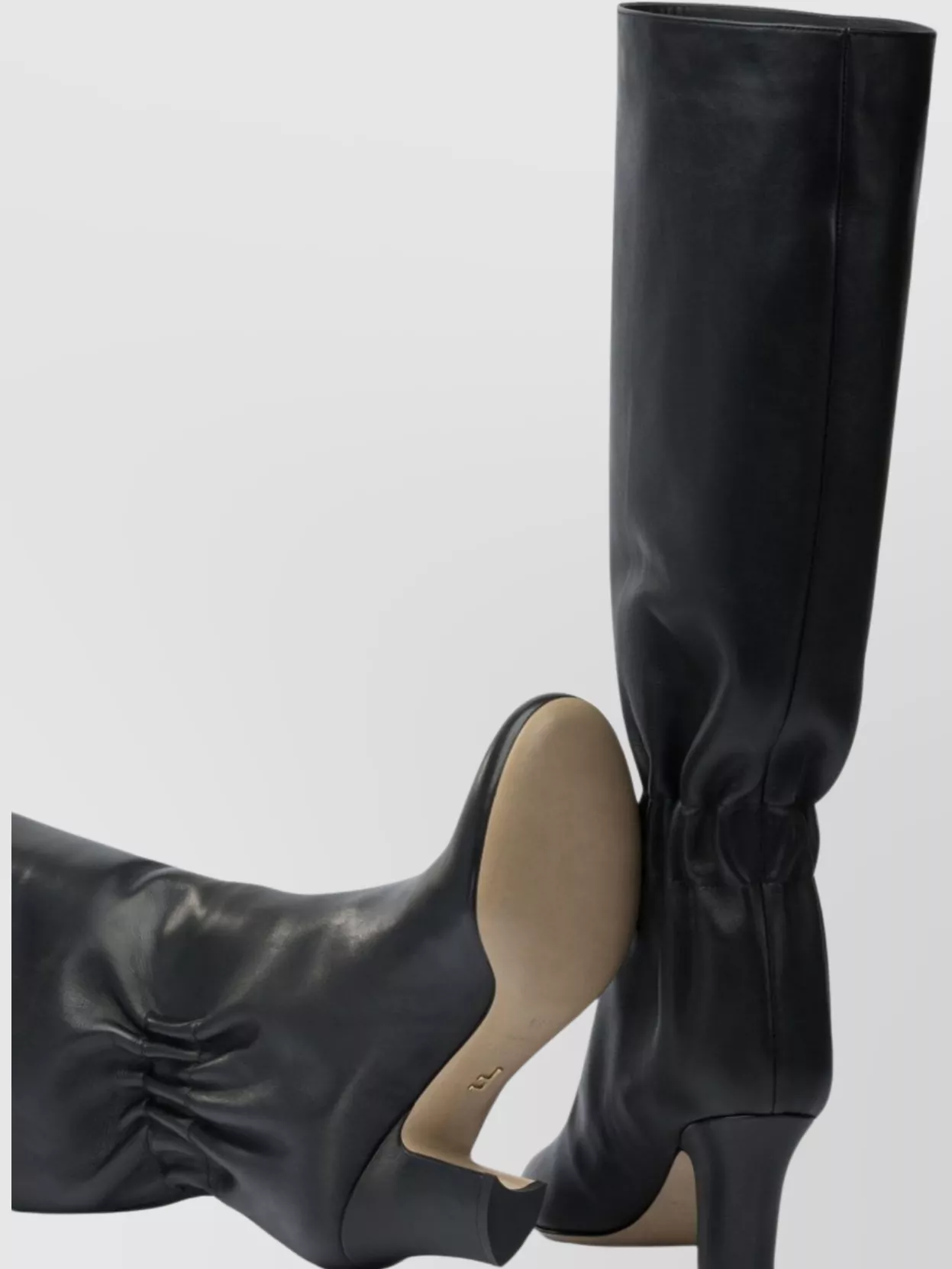 Ferragamo Knee-high Boots With Curled Design And Block Heel In Black