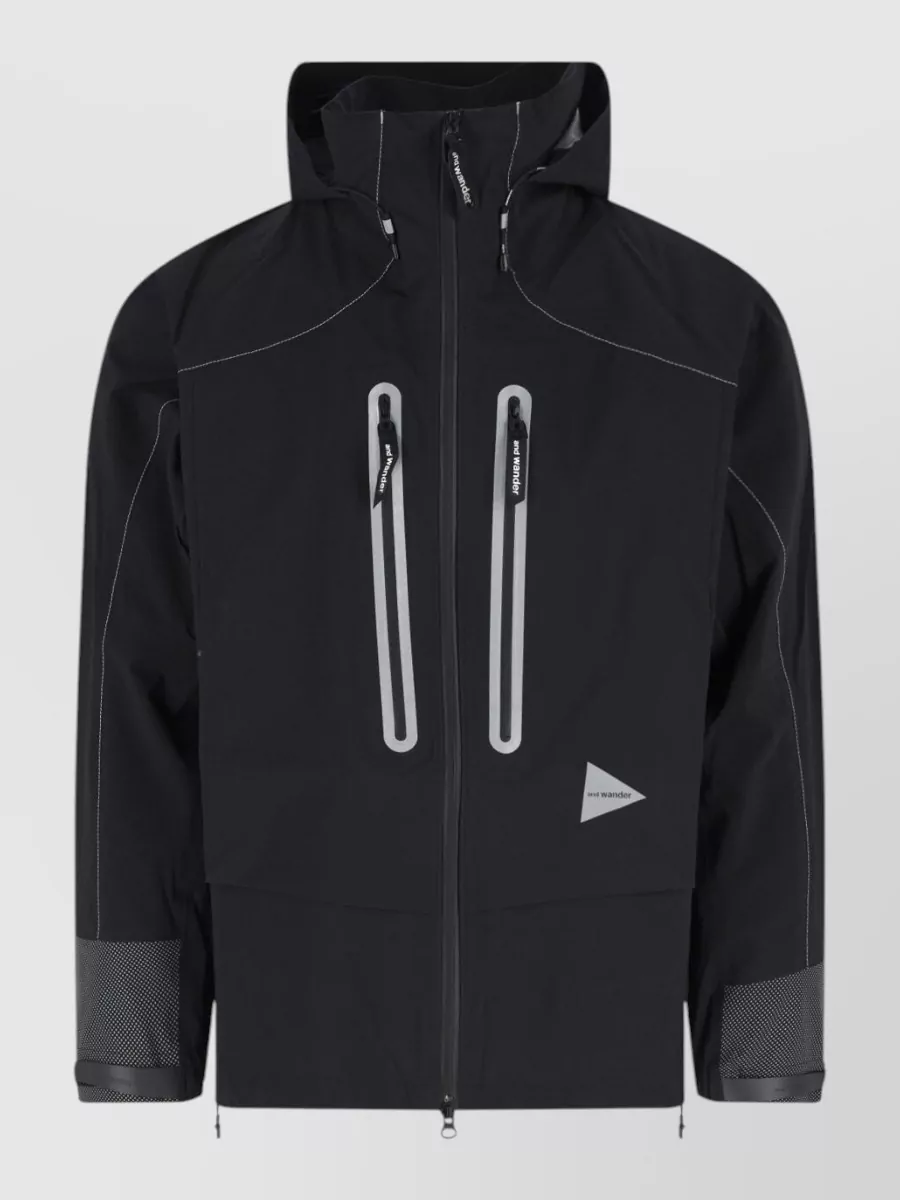 And Wander raincoat