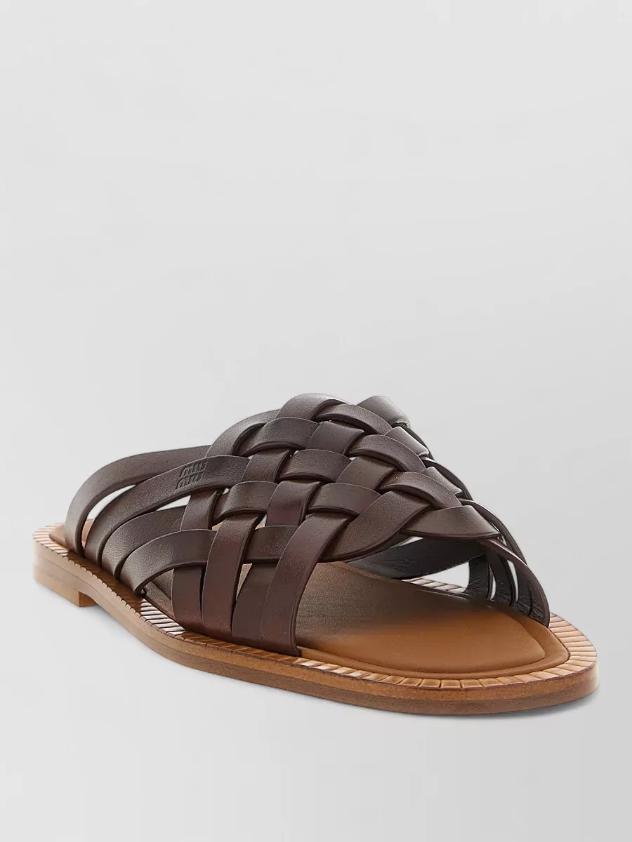 Miu Miu leather woven slides