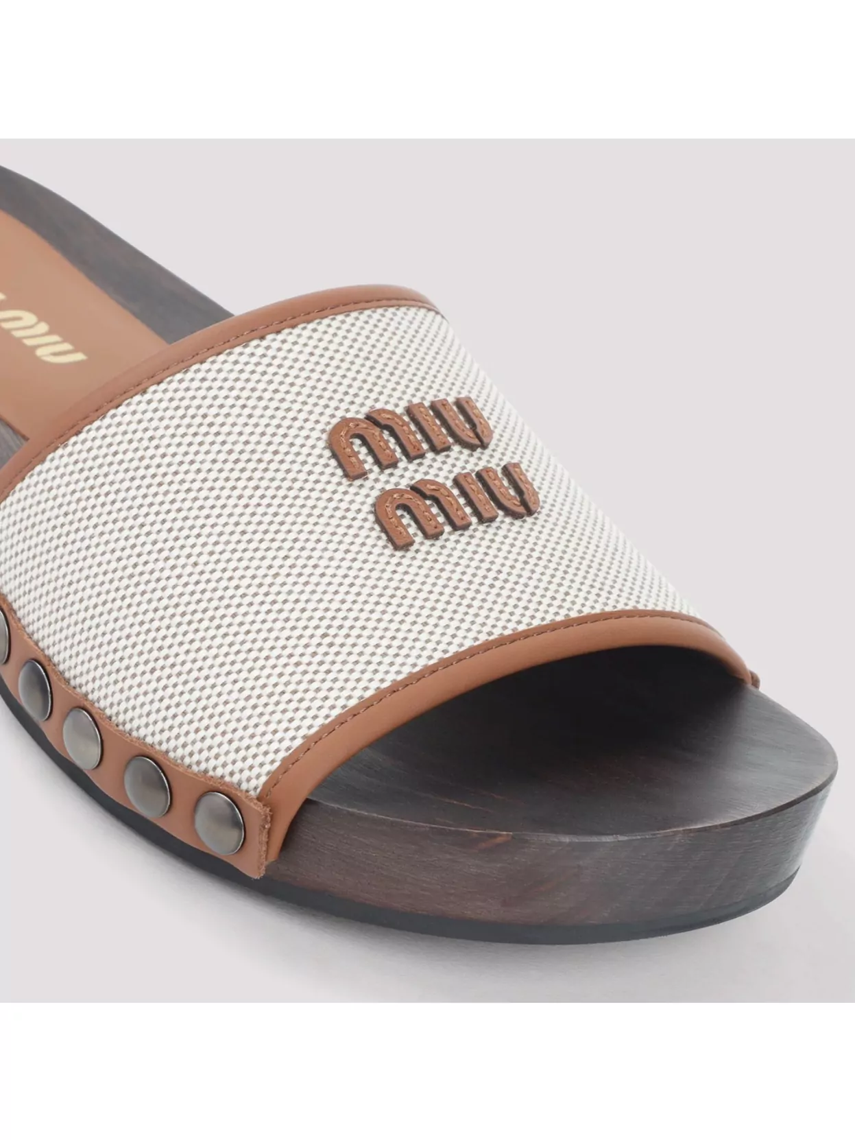 MIU MIU CANVAS AND LEATHER STUDDED CLOG SANDALS