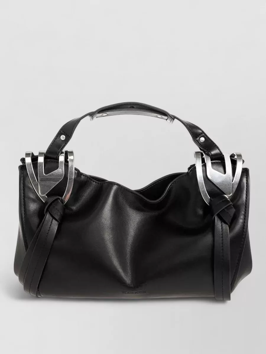 Diesel small polyurethane knot-d top handle bag — Our Legacy’s washed charcoal hobo mirrors the jeans’ faded black tone, stays in the same casual price tier, and reinforces the off-duty streetwear feel with a soft, slouchy shape.