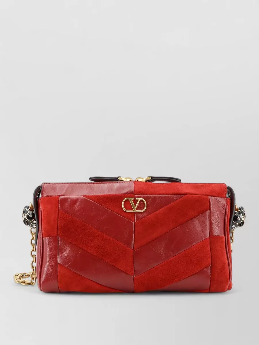 Valentino Garavani panthea small leather and suede clutch bag