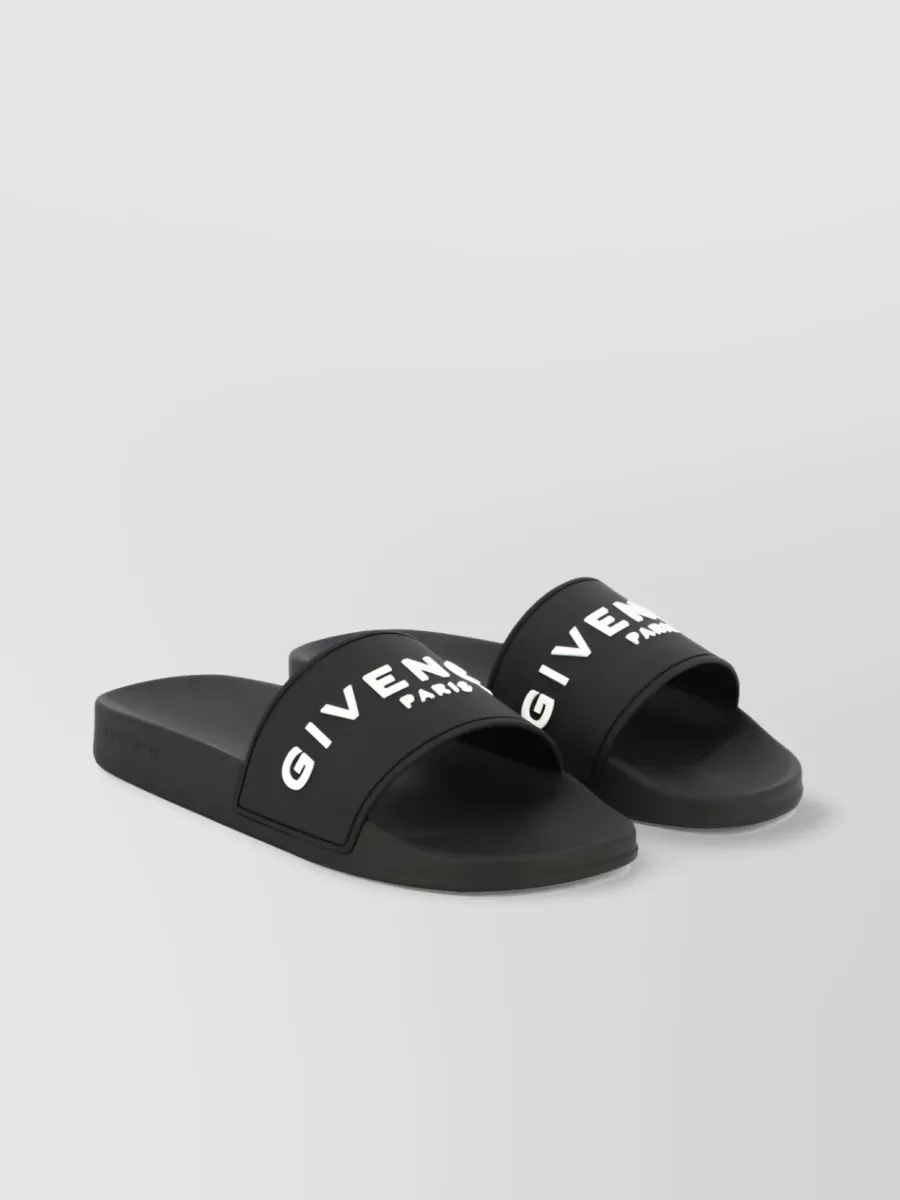 Shop Givenchy Embossed Logo Faux-leather Slides In Black