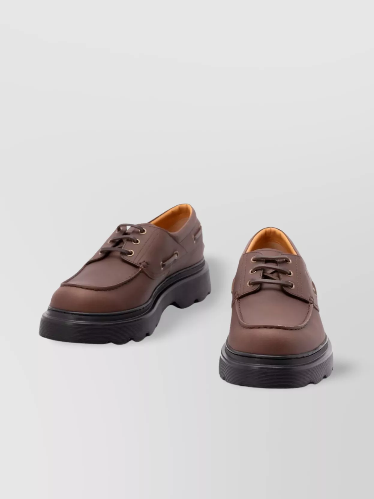 Tod's Boat Shoes With Chunky Sole And Eyelet Detailing