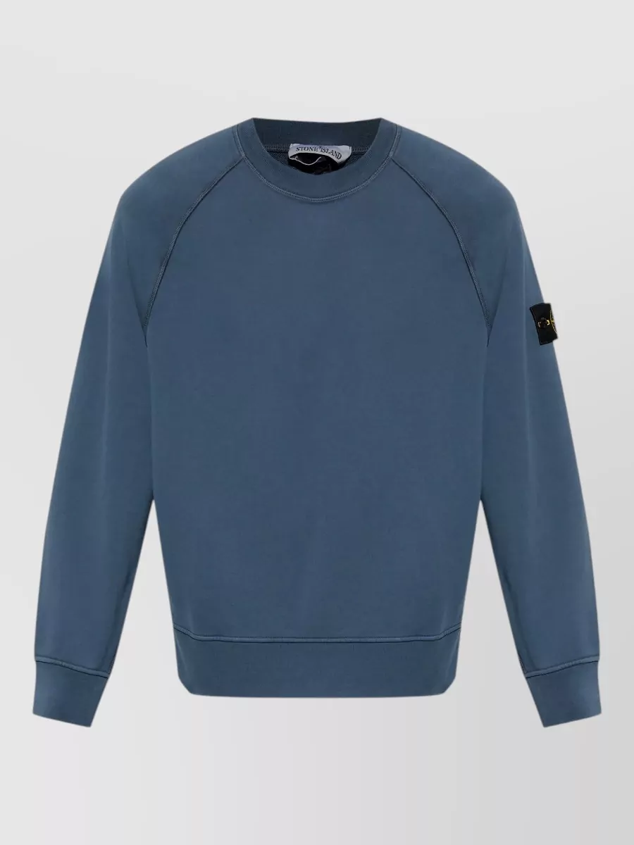 Stone Island Ribbed cotton sweatshirt — The deep navy tee in I mirrors the trouser tone for a clean Stone Island set that keeps the straight-leg cargo silhouette feeling sharp and urban rather than loungey.