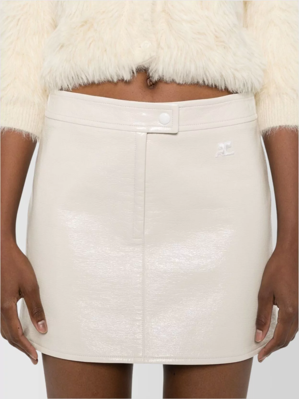 Courrèges Buttoned Knee And Midi Skirts