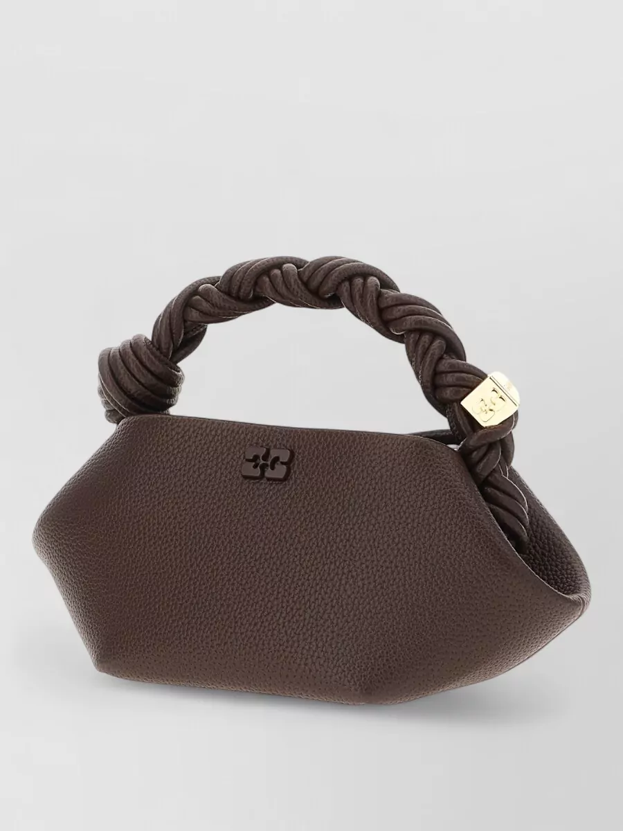 Ganni bou mini leather clutch bag — The Ganni chocolate hexagonal clutch mirrors the dress tone, keeps to a subtle gold hardware story with the Gucci logo and feels refined yet modern for dinner-to-cocktails.