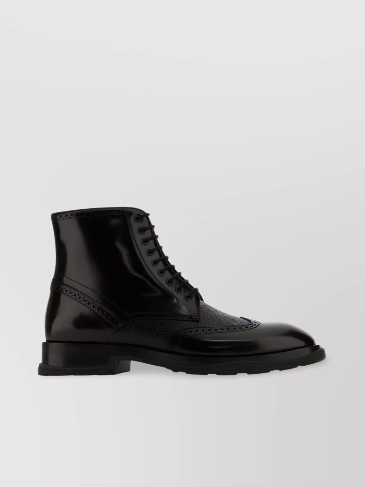 Shop Alexander Mcqueen Ankle Boots With High Shine And Brogue Detailing In Black