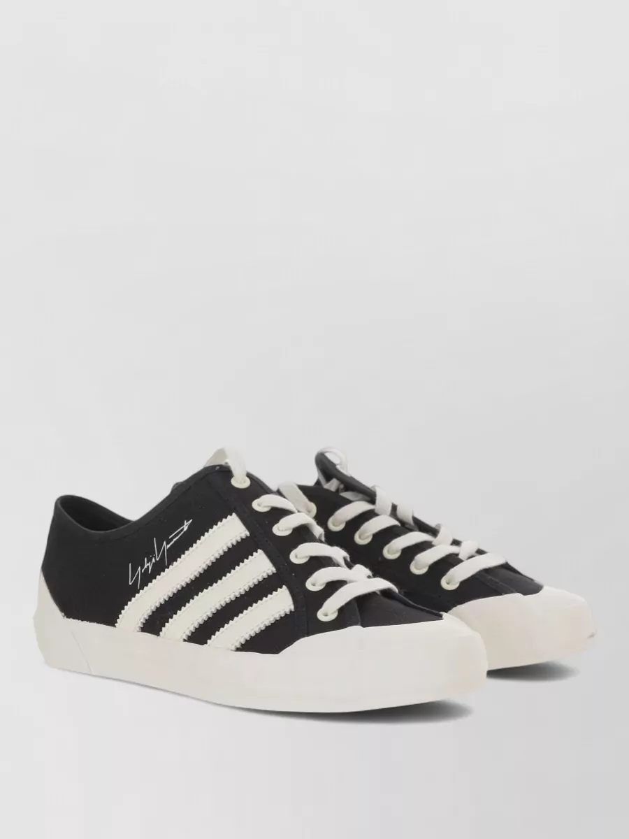 Y-3 canvas low-top lace-up sneakers