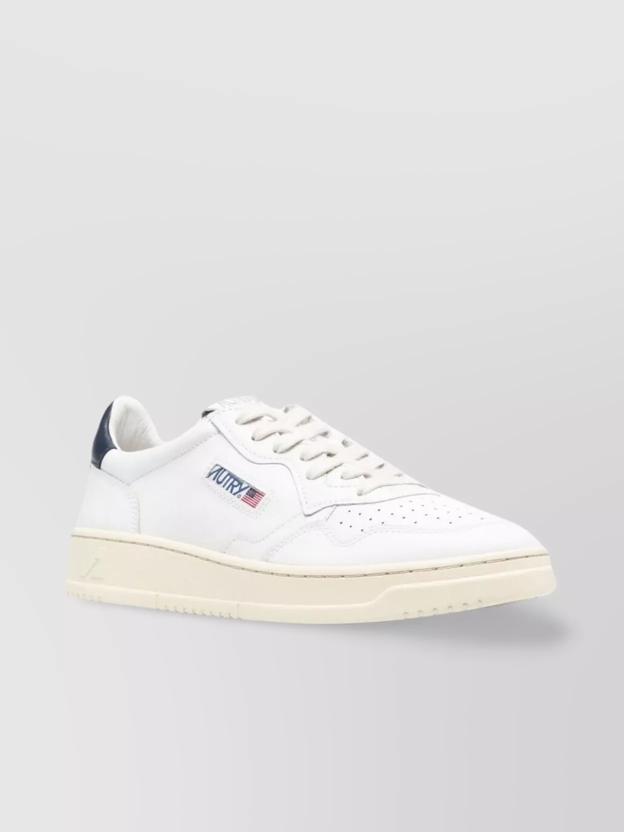 Shop Autry Perforated Detailing Low Top Sneakers