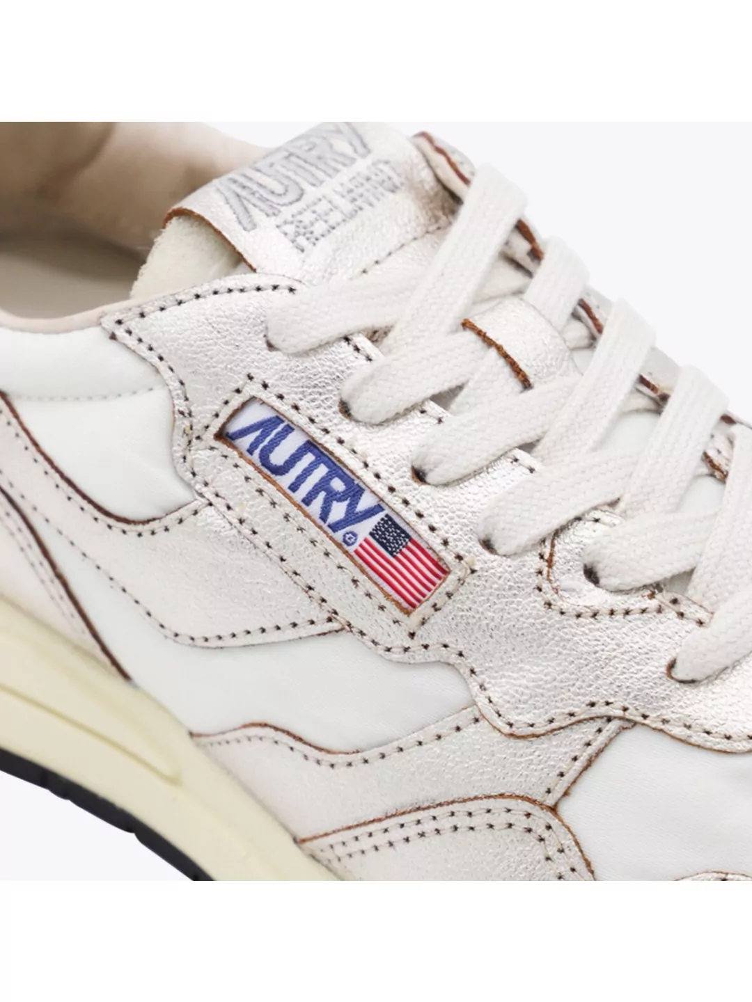 Autry Low Top Silhouette Sneakers With Contrast Sole In White