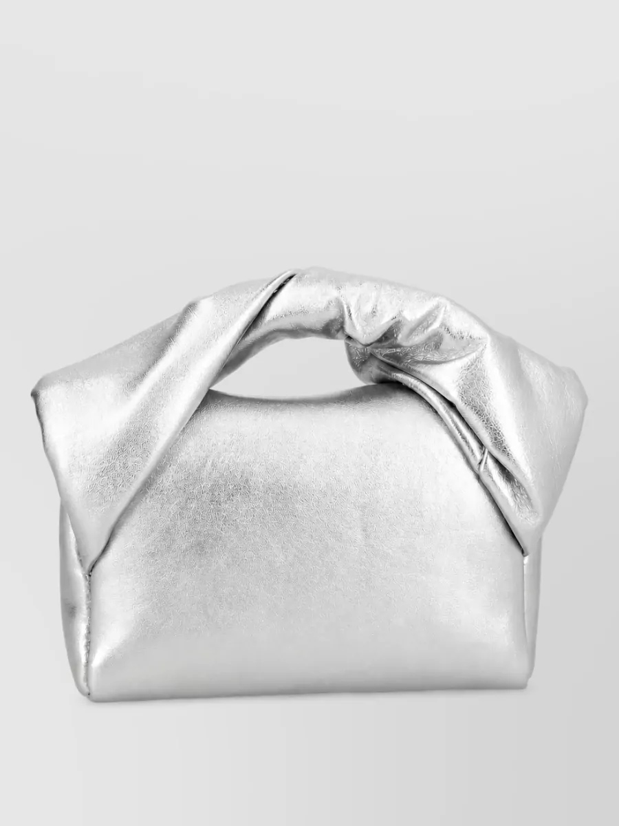 JW Anderson leather clutch bag