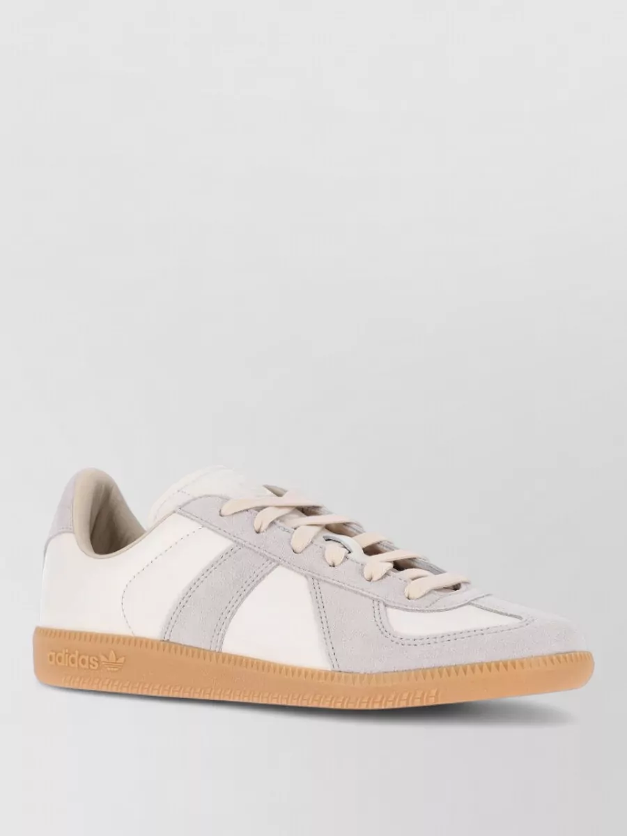 Adidas leather low top lace-up sneakers