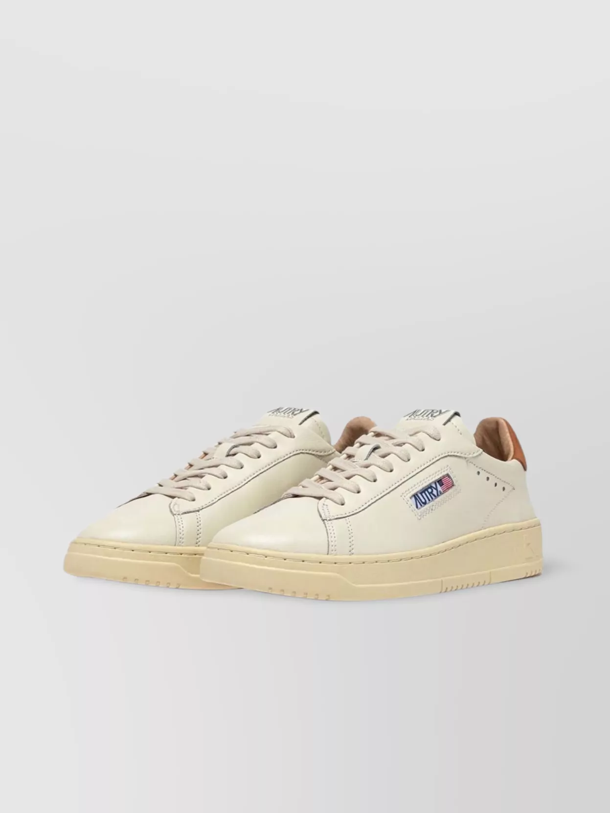 Autry Low Top Leather Sneakers In Neutral
