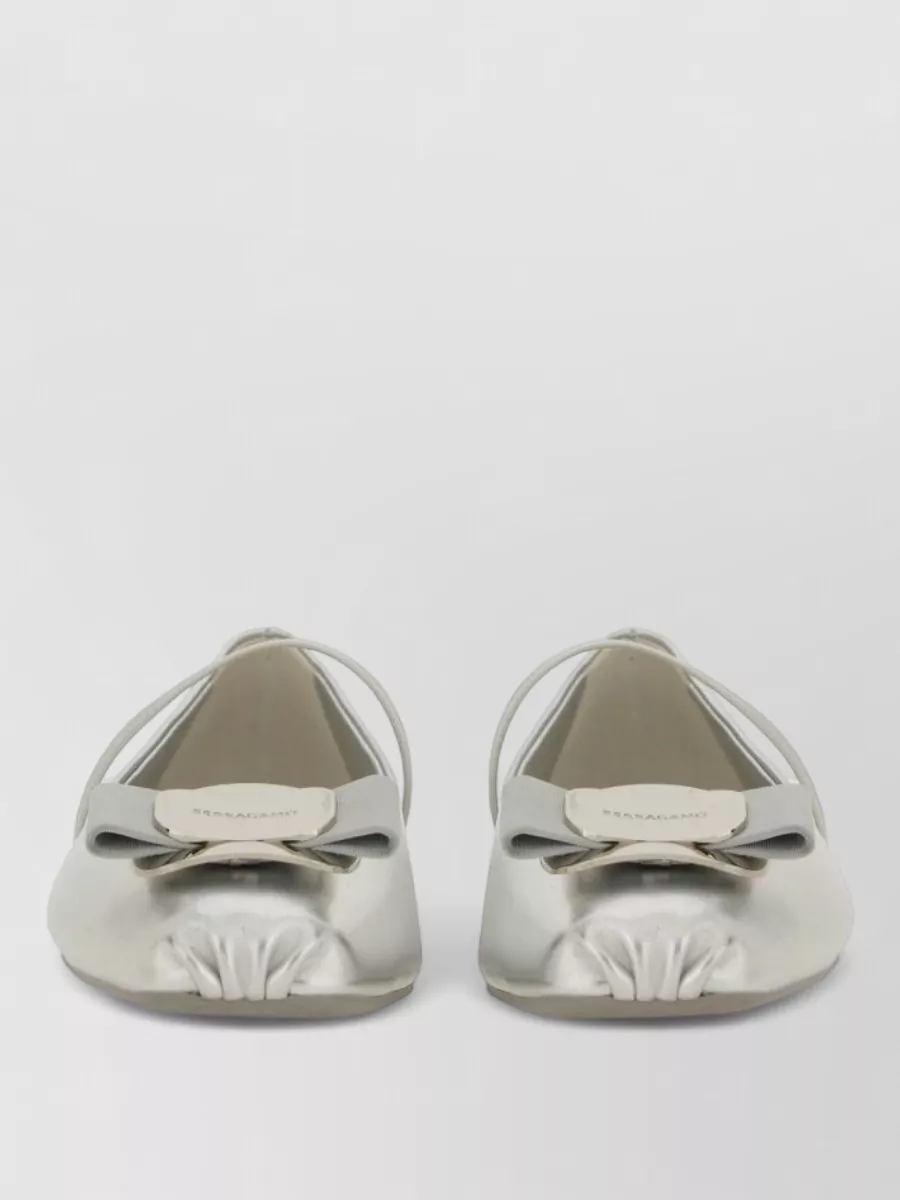 Ferragamo Leather ballerina shoes — The silver Ferragamo ballerina in K mirrors the knit’s soft silver florals, adds a romantic note without height, and keeps the outfit refined for day-to-dinner wear.