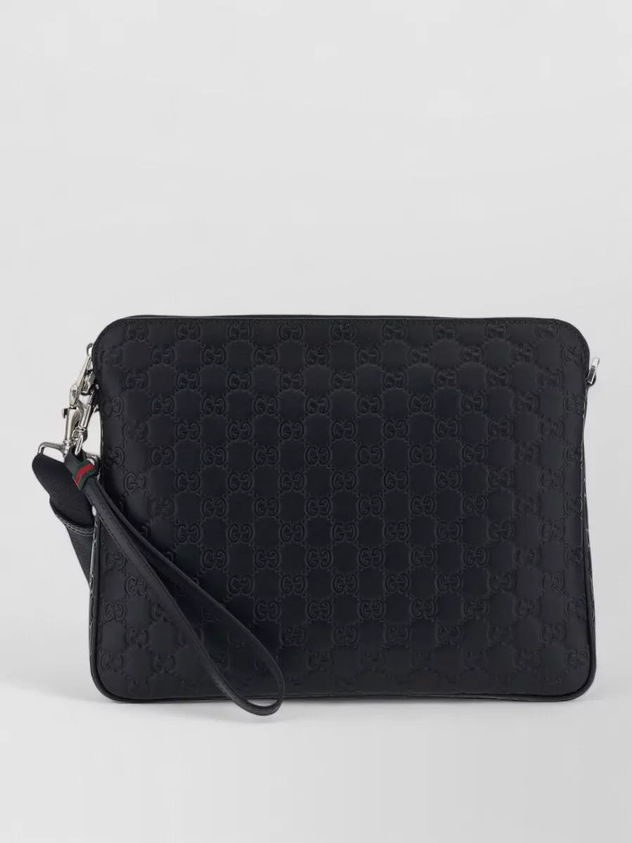 Gucci gg enblem leather clutch bag