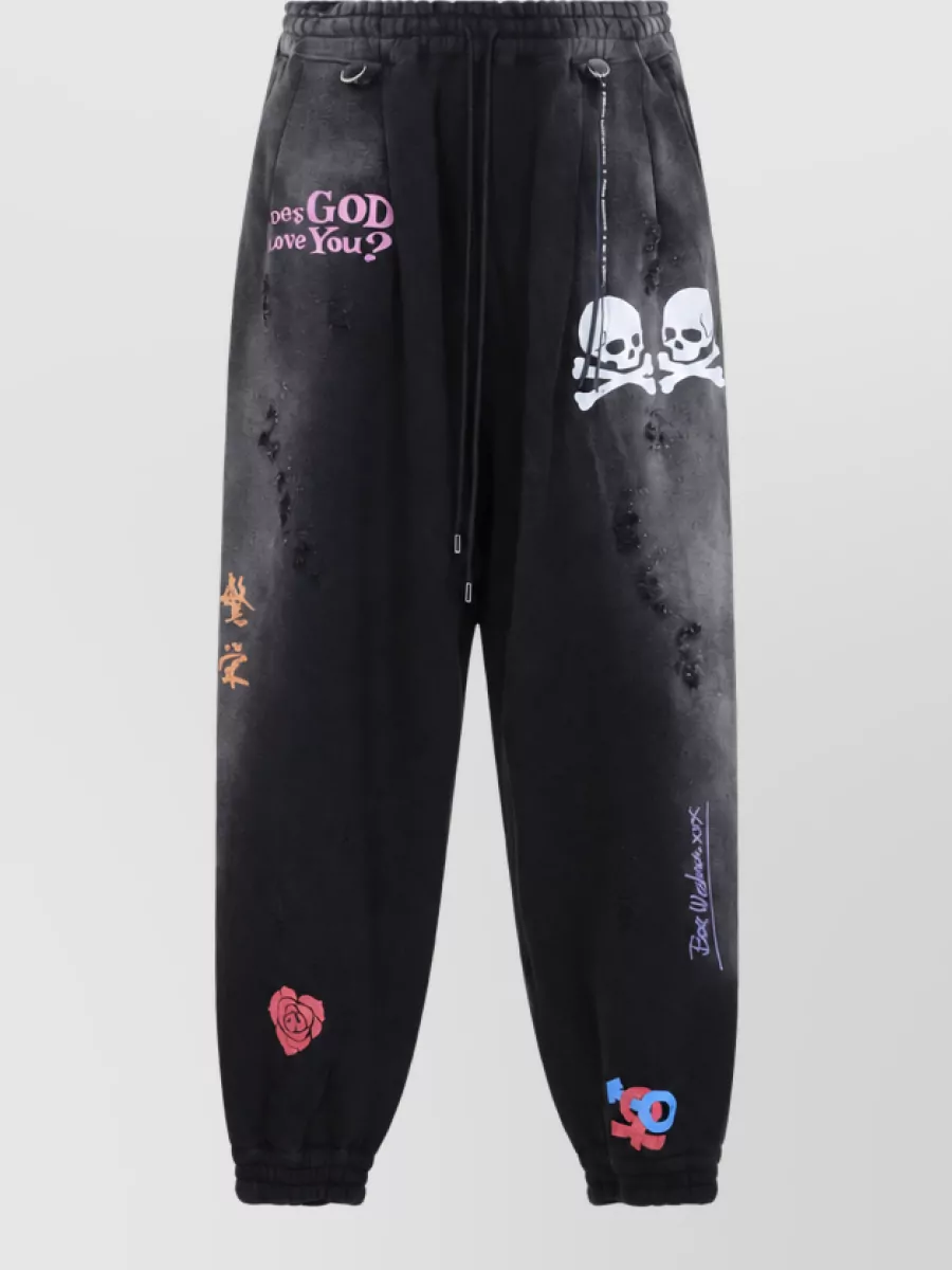 Mastermind World printed cotton tapered track pants