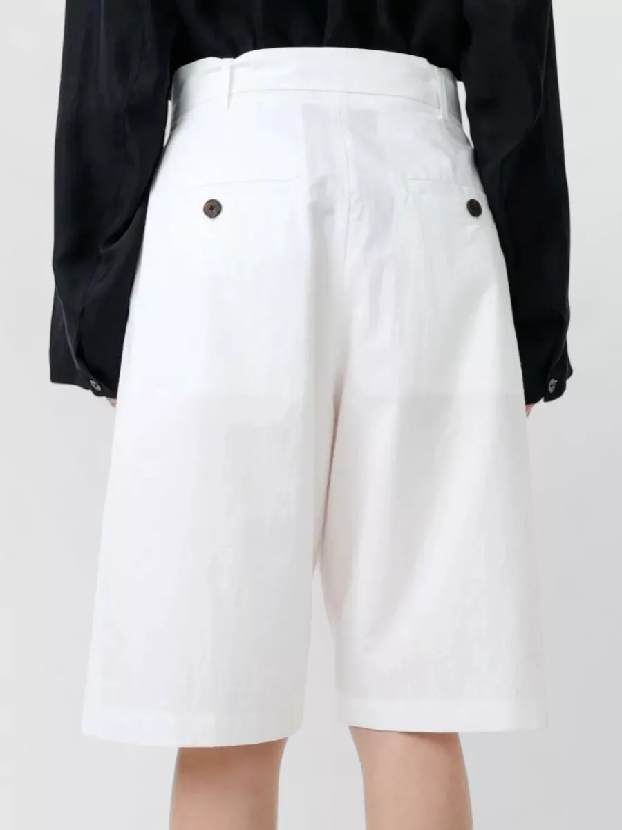 Studio Nicholson Pleated Cropped Trousers