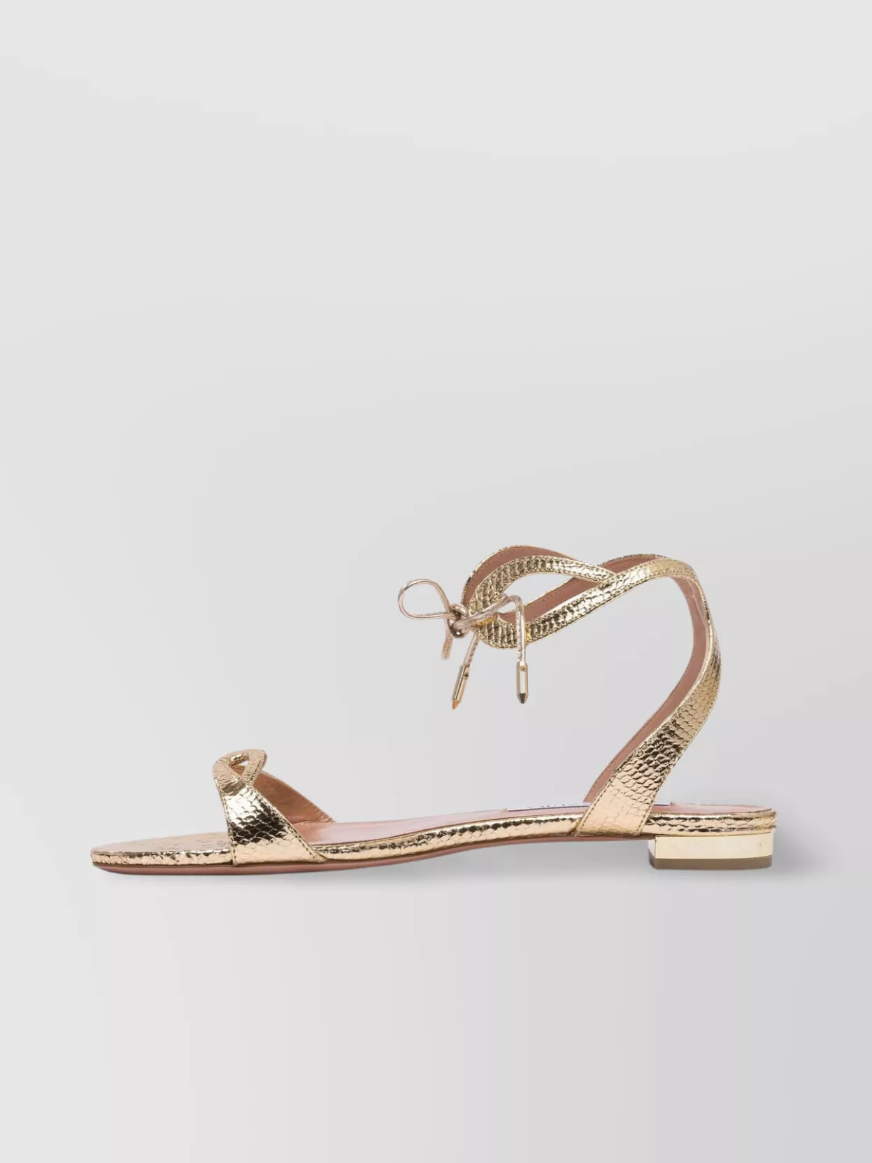 Shop Aquazzura Metallic Bow Detail Flat Sole Sandals