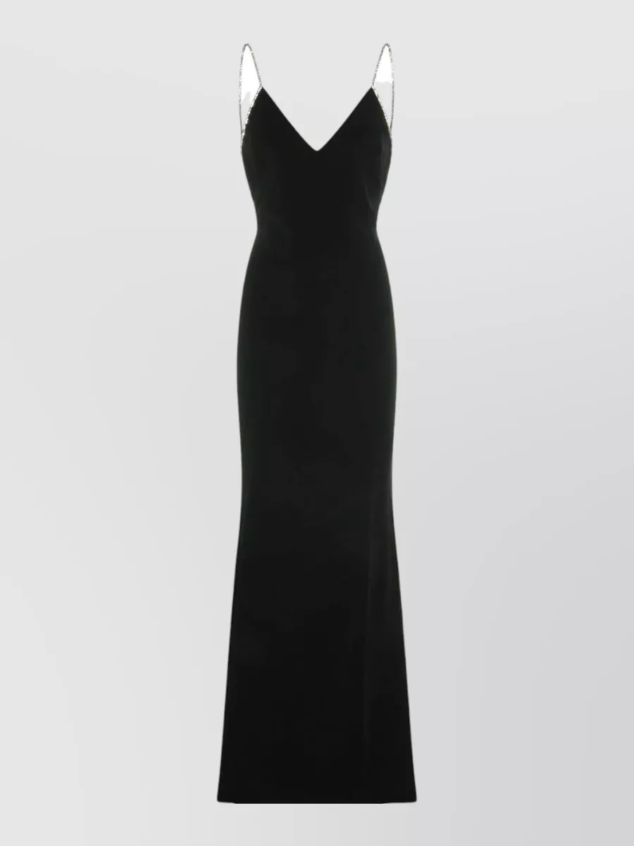 Tom Ford Crystal-embellished satin sleeveless v-neck evening gown — The diamanté strap slip gown mirrors the sandals’ metallic hardware and liquid attitude, creating a clean column that lets the barely-there heel and padlock detail stay center stage.