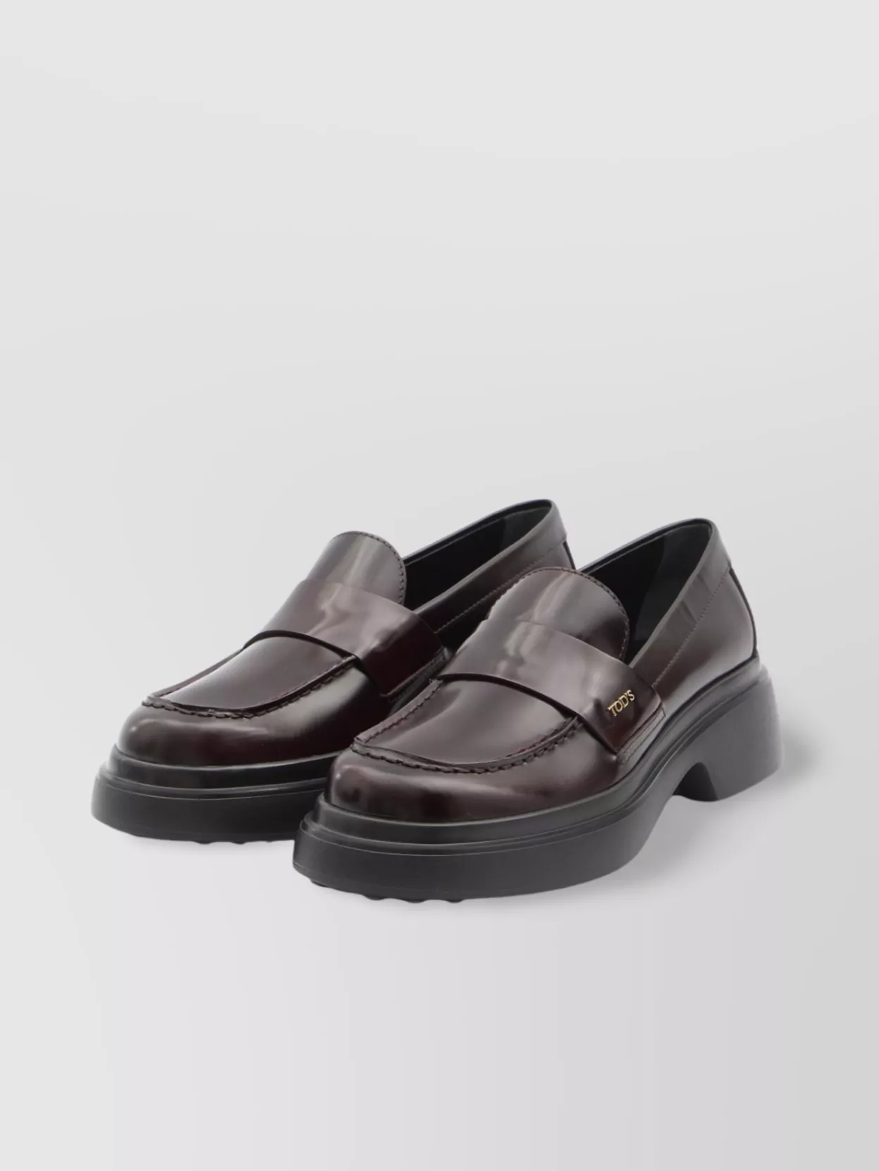 Tod's Logo Plaque Glossy Leather Loafers In Burgundy