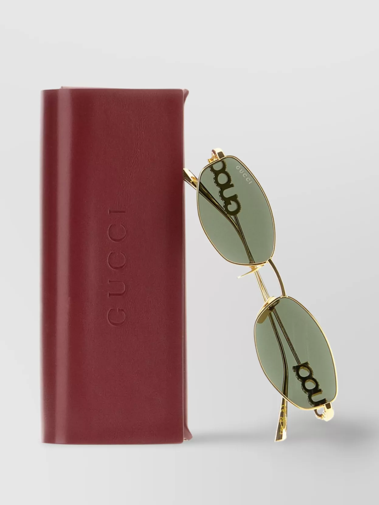 Gucci Metal Sunglasses With Oval Frame
