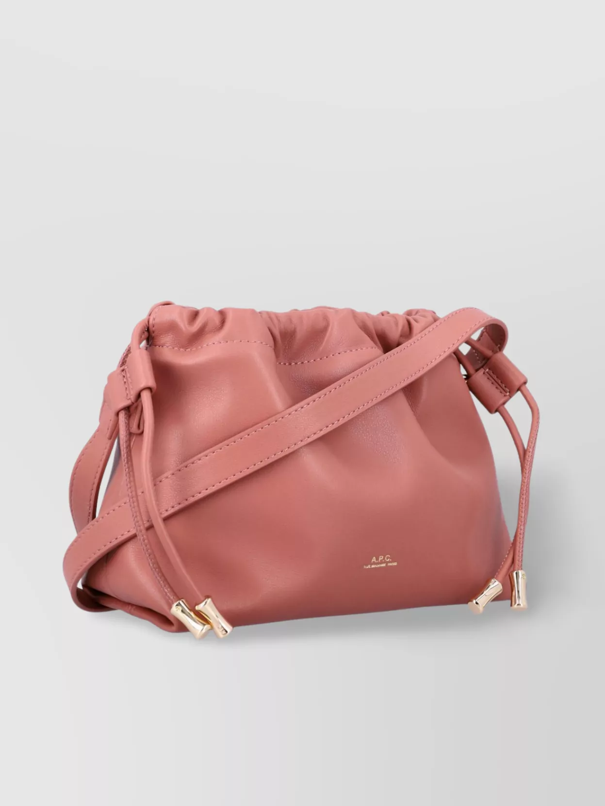 Apc Ninon Mini Pink Crossbody Bag With Embossed Logo On The Front And Adjustable Shoulder Strap In Ecole