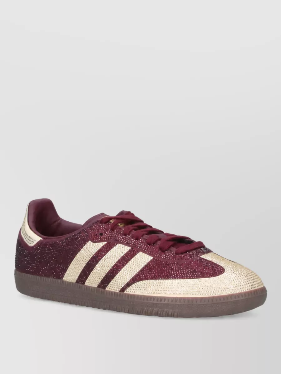 Adidas low top lace-up sneakers