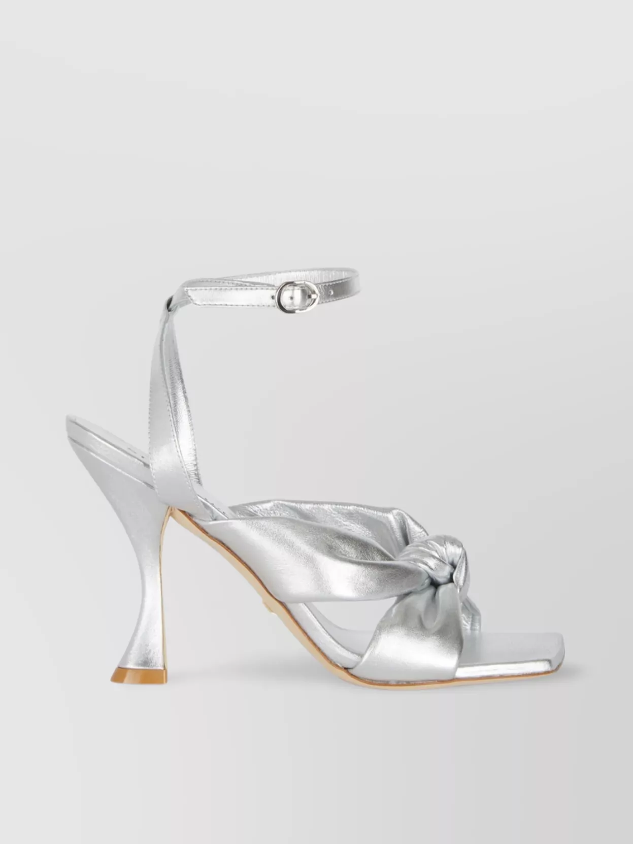 Stuart Weitzman Heeled Sandals With Knot Detail And Metallic Finish In Grey