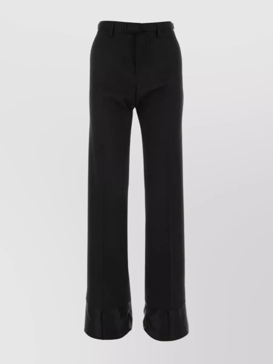 Shop Mm6 Maison Margiela Streamlined Pleated Wide-leg Trousers In Black