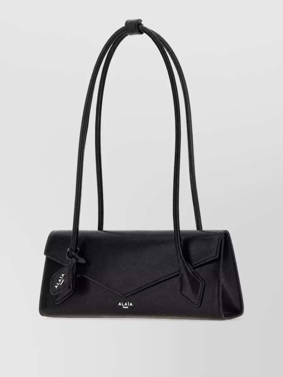 Alaïa leather clutch bag