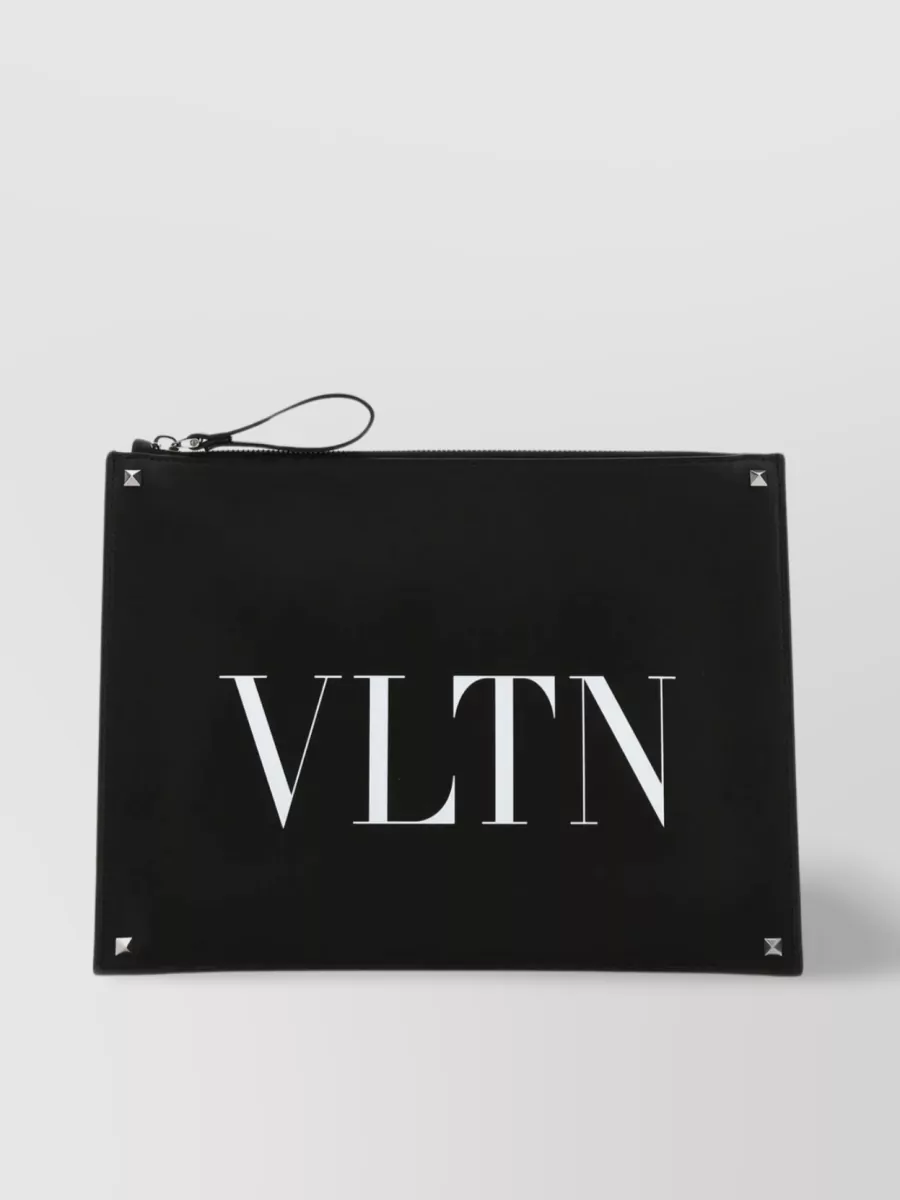 Shop Valentino Leather Clutch With Wristlet Strap And Stud Detailing In Black