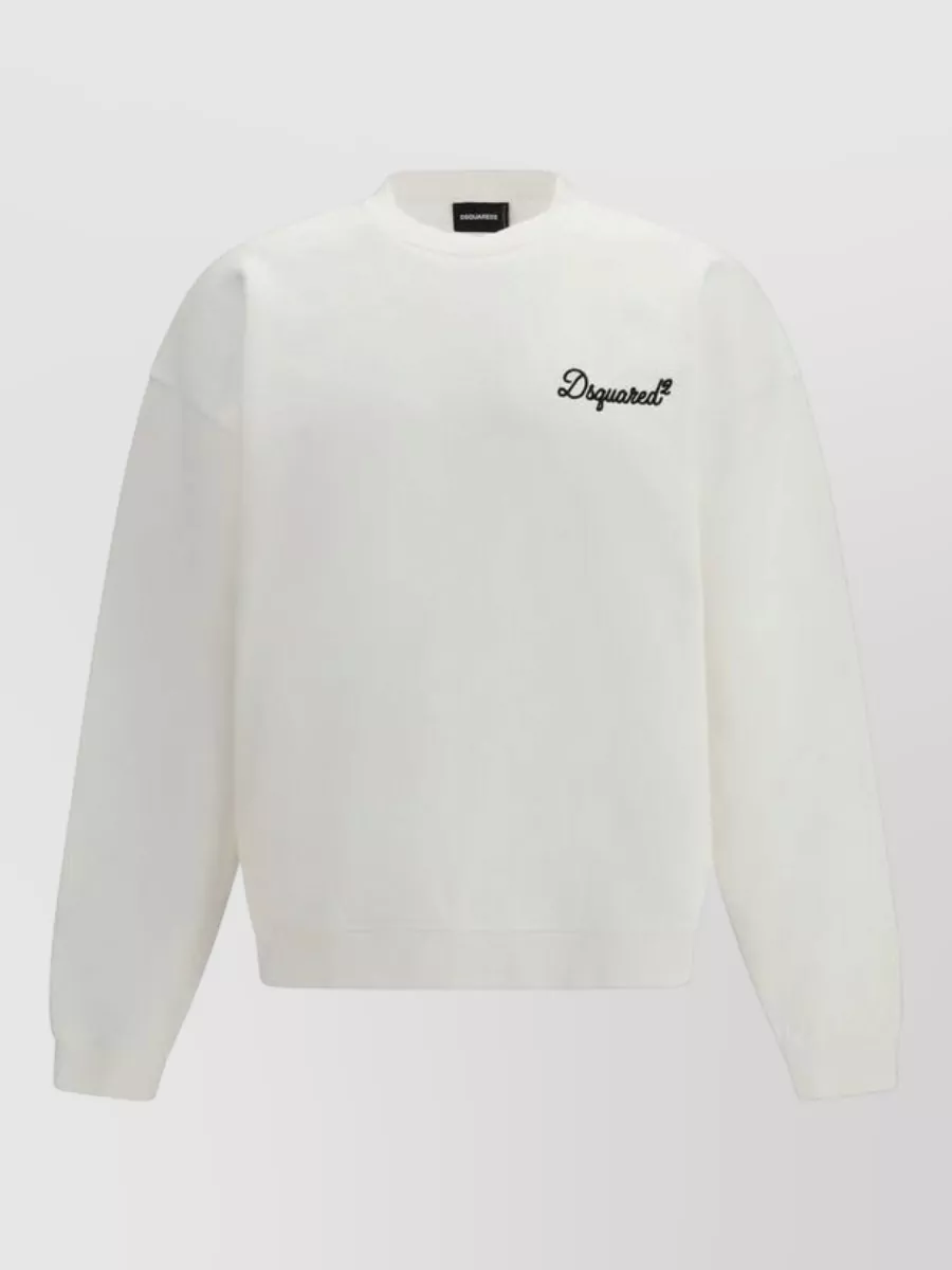 Dsquared2 Cotton tank top — The off‑white Dsquared2 sweatshirt mirrors the sneakers’ light sole, keeps branding quiet, and gives a clean streetwear base that balances their chunky profile without feeling heavy.
