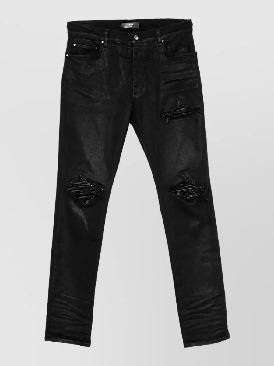 Amiri waxed distressed skinny denim jeans
