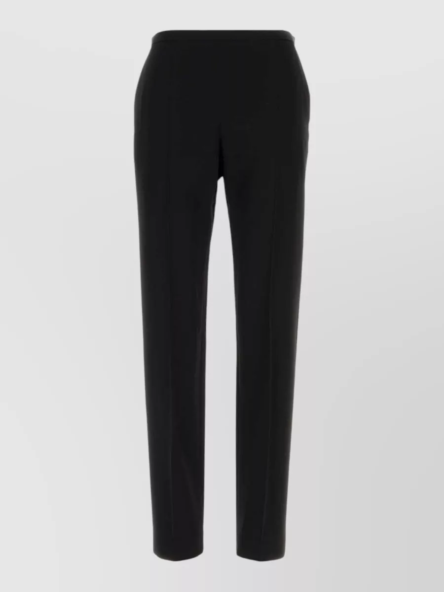 The Row wool slim-fit trousers