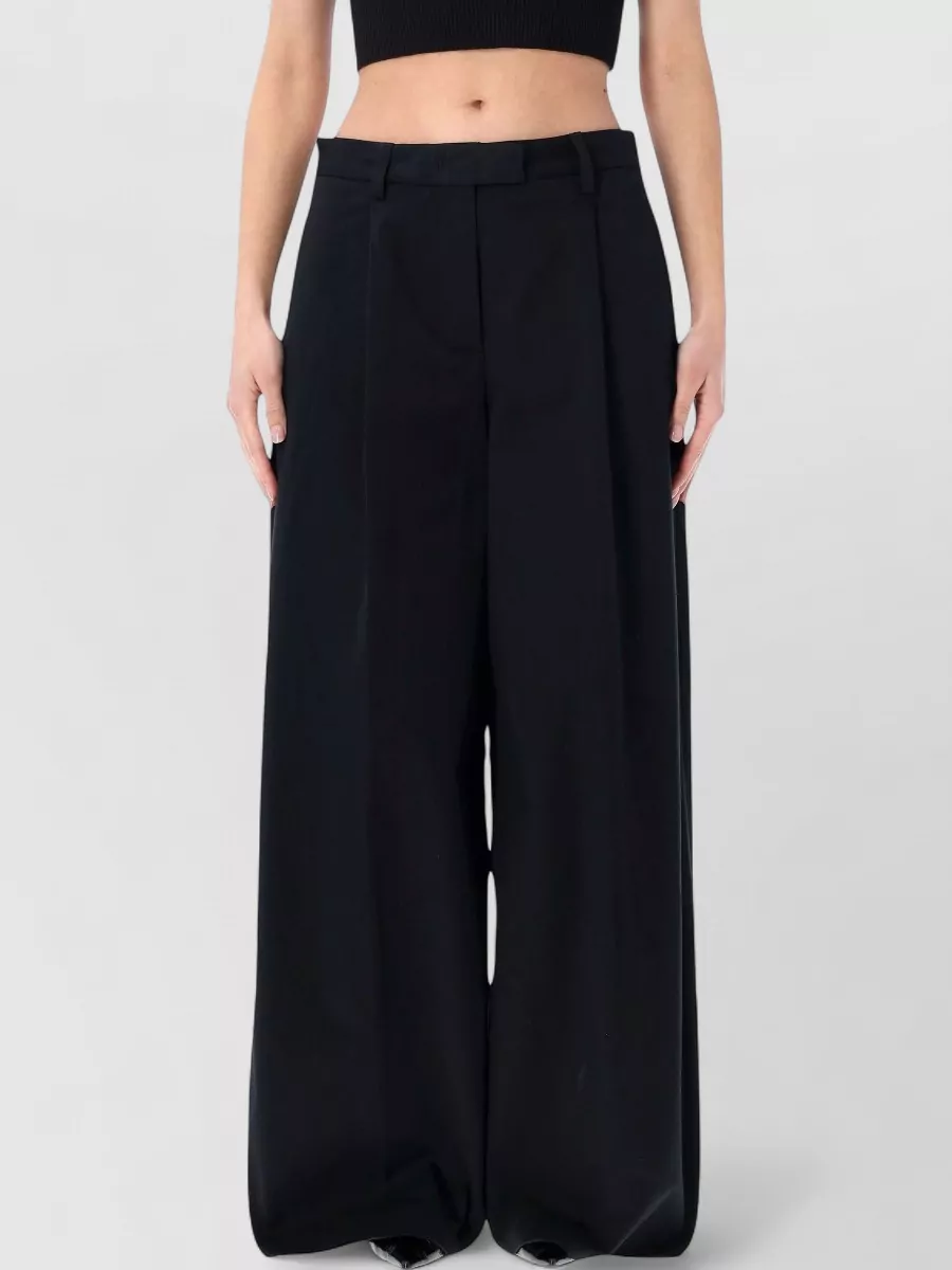 Thelatest cotton pleated wide-leg tailored trousers