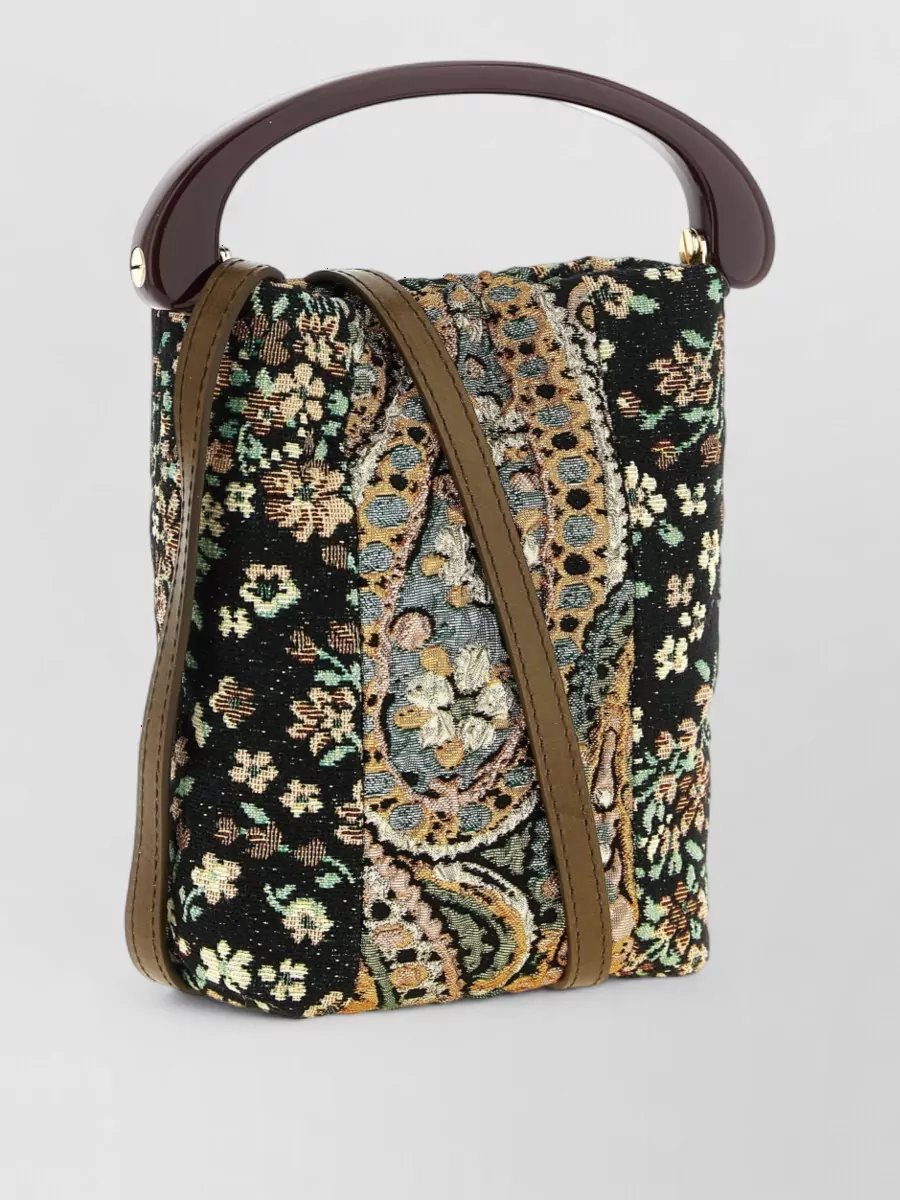 Dries Van Noten Floral jacquard tote bag — The Dries Van Noten compact floral tote adds a romantic, tapestry texture and earthy tones that echo the dress’s shadowy florals while staying polished enough for dinner and gallery settings.