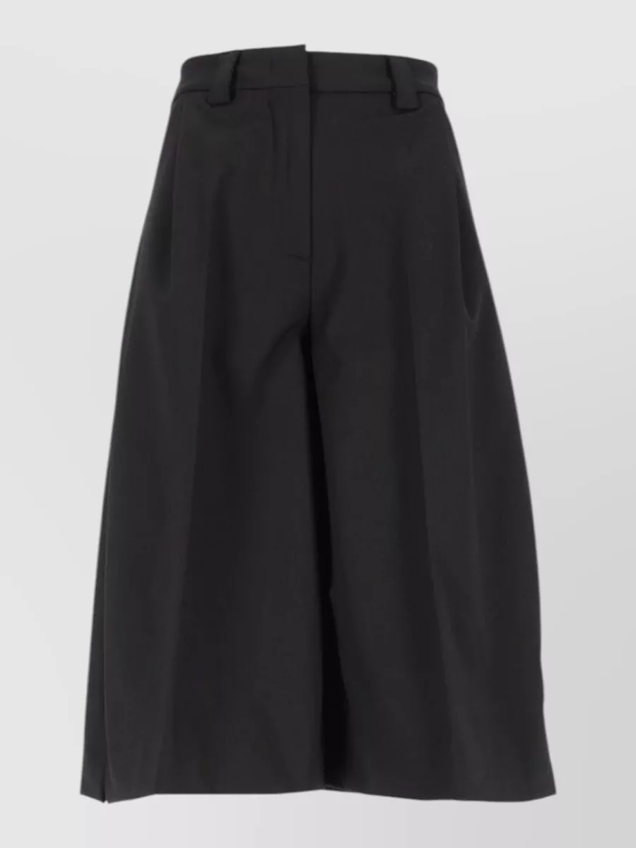 Thelatest wool-blend pleated knee-length wide-leg tailored shorts
