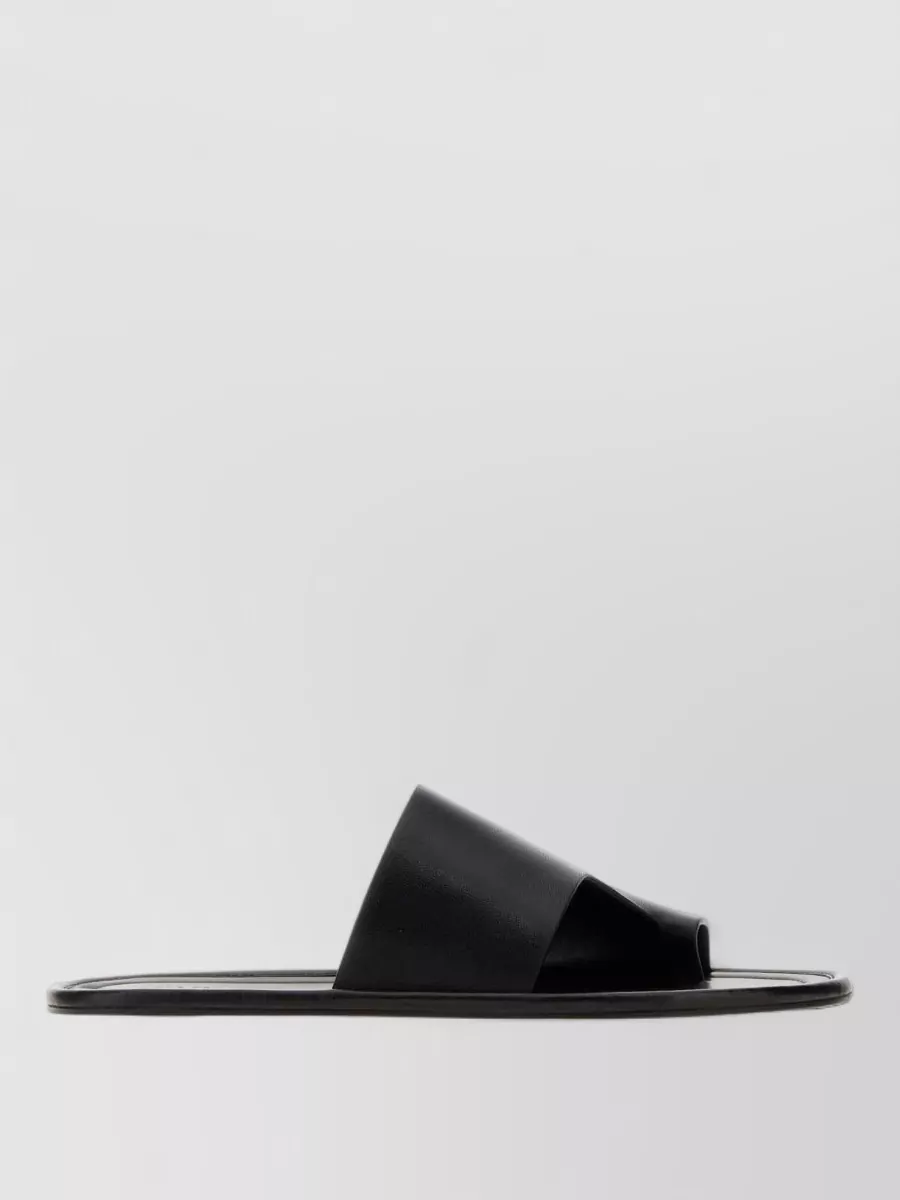 The Row leather thong slippers