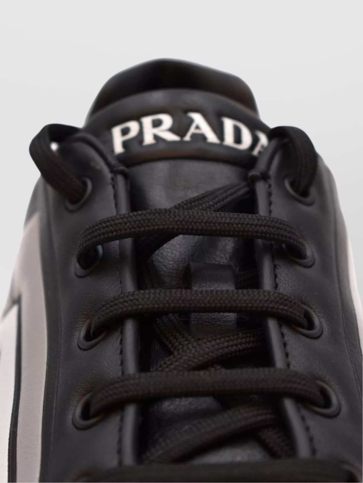 Prada Stylish Sneakers With Metallic Accents And Rubber Sole