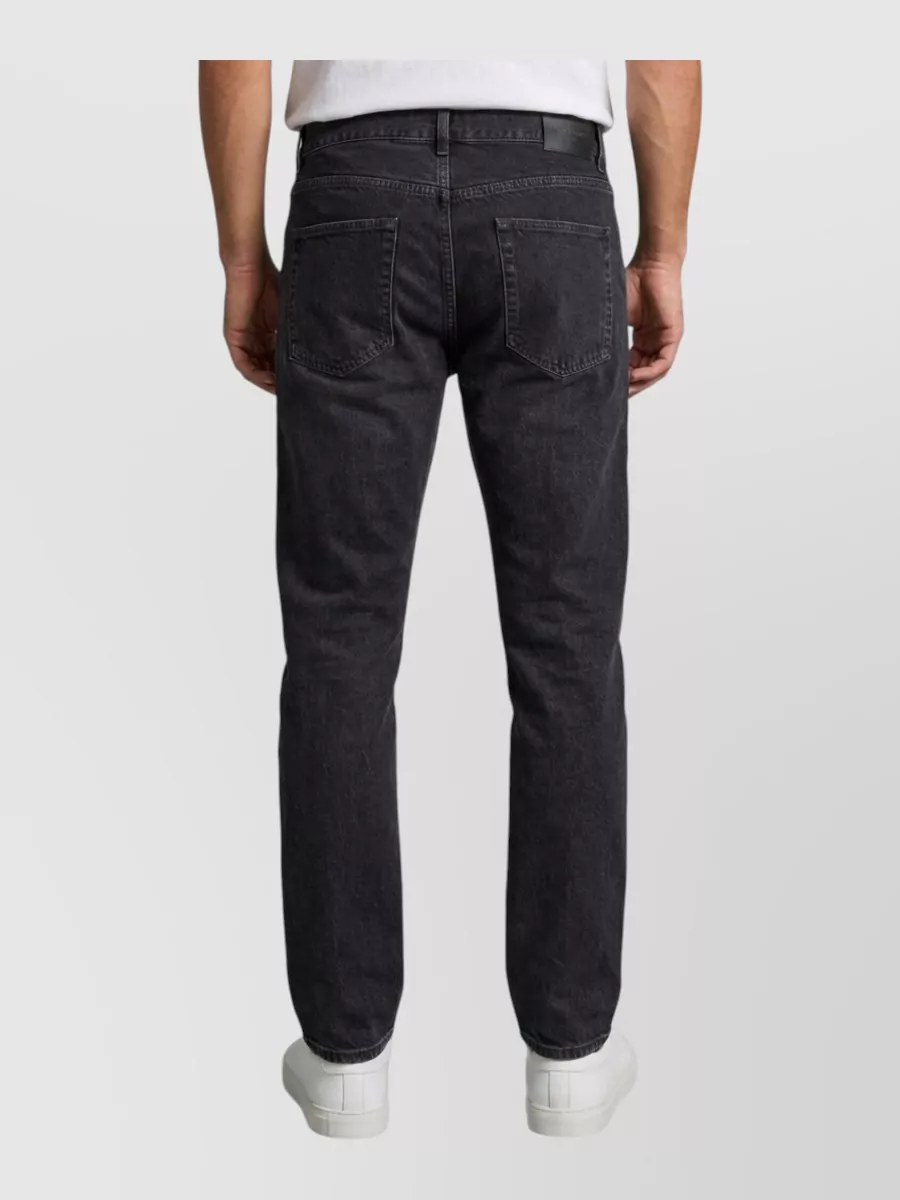 Saint Laurent Relaxed Tapered Denim Jeans