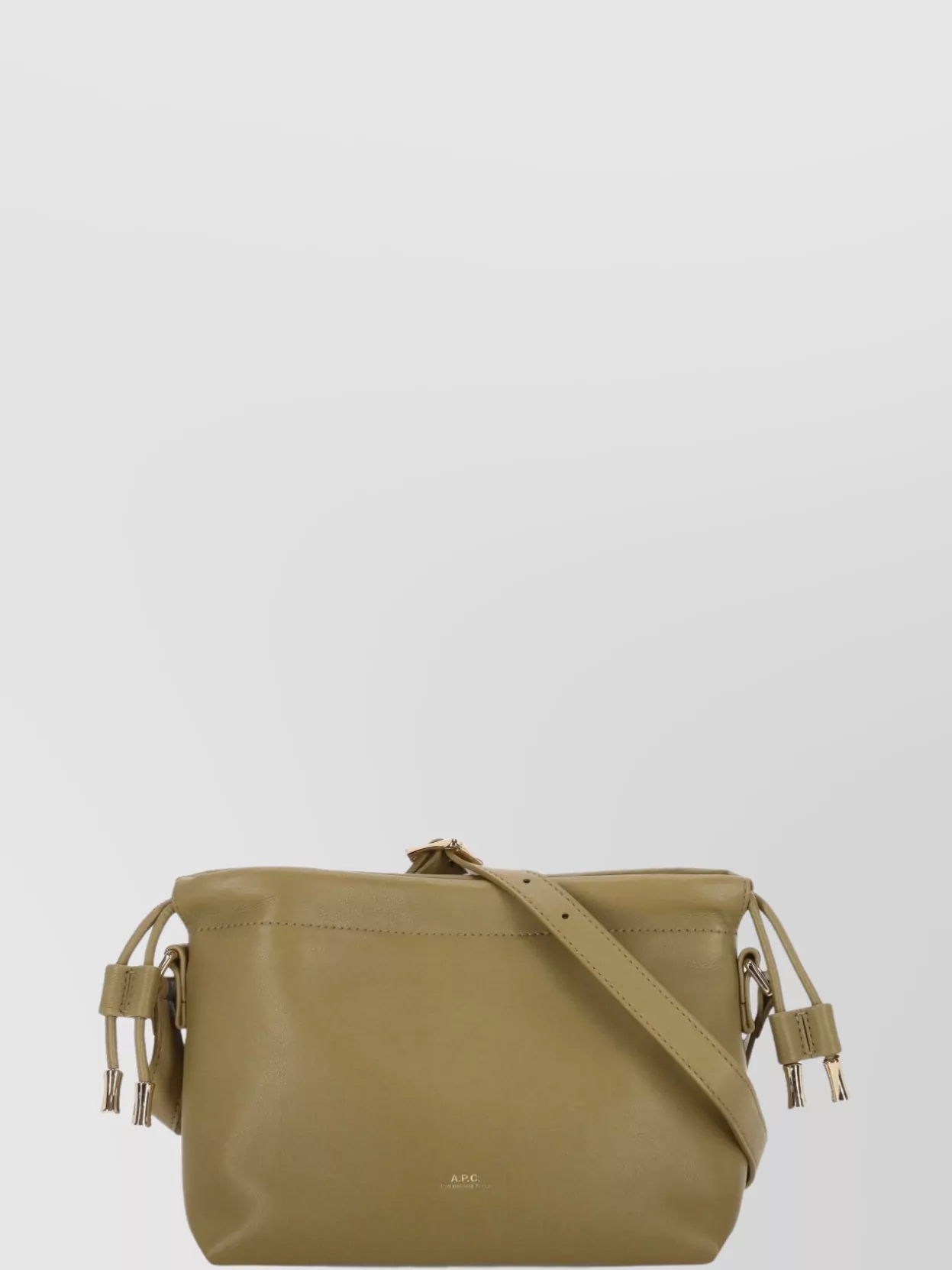 A.P.C. ninon mini crossbody bag — The small olive-beige cross-body keeps things compact and hands-free, its muted neutral tone complementing the camel and ivory without competing with the relaxed sport vibe.