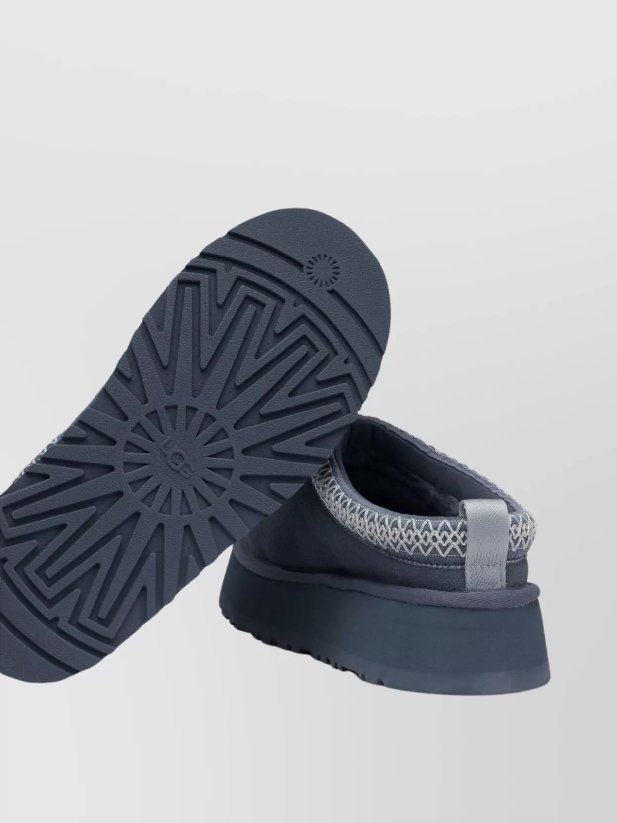 UGG SLIP-ONS WITH EMBROIDERED TRIM AND PLATFORM SOLE