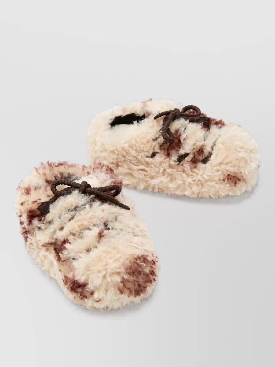 Moon Boot curly slippers