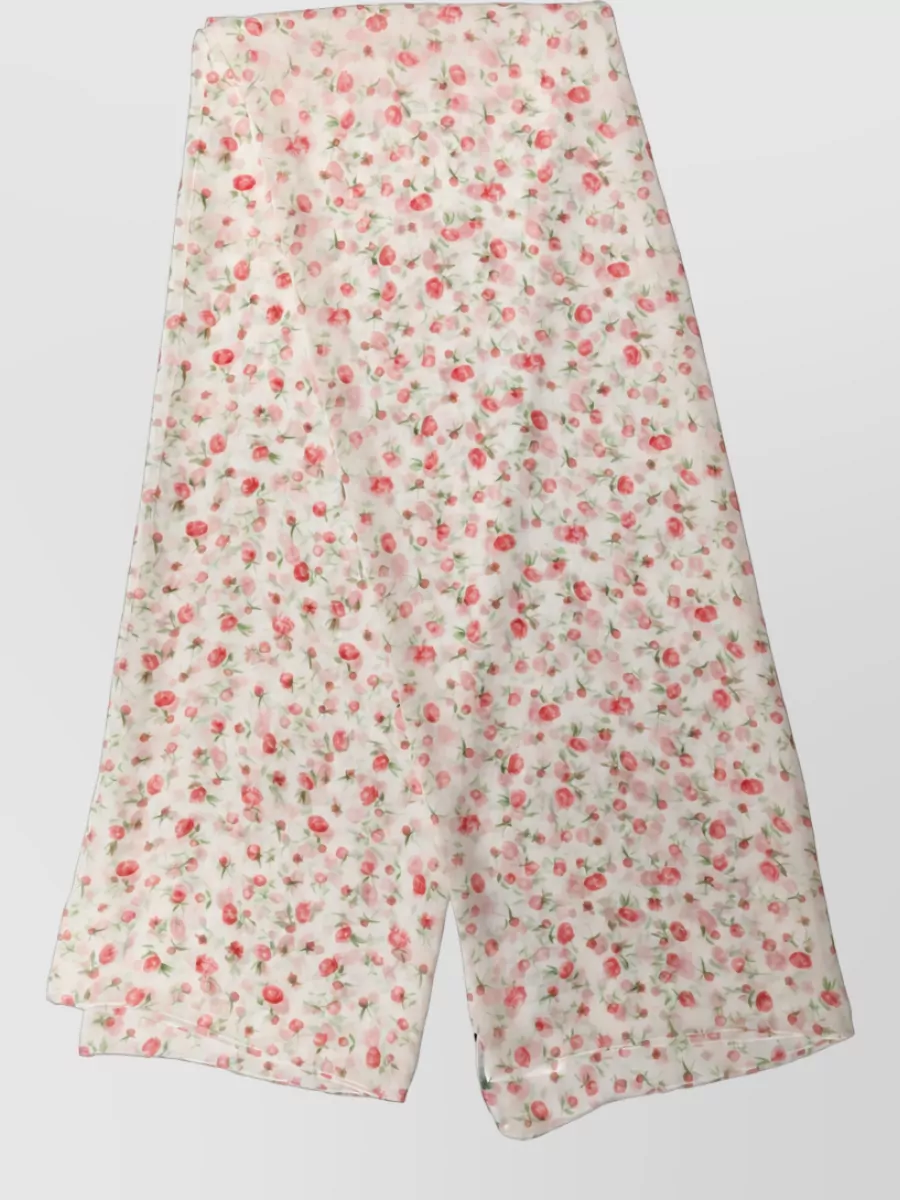 Dolce&Gabbana Silk floral-print long scarf — The sheer Dolce&Gabbana rose-print scarf can be tied at the handle or worn in the hair, subtly repeating the floral story without disturbing the clean lines of the outfit.
