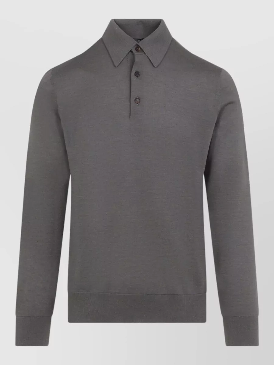 Zegna Cashmere silk long-sleeve polo shirt — The charcoal fine-gauge polo sits perfectly under the charcoal blazer in both palette and formality, giving a modern, softly tailored boardroom-to-dinner look without competing with the jacket’s texture.
