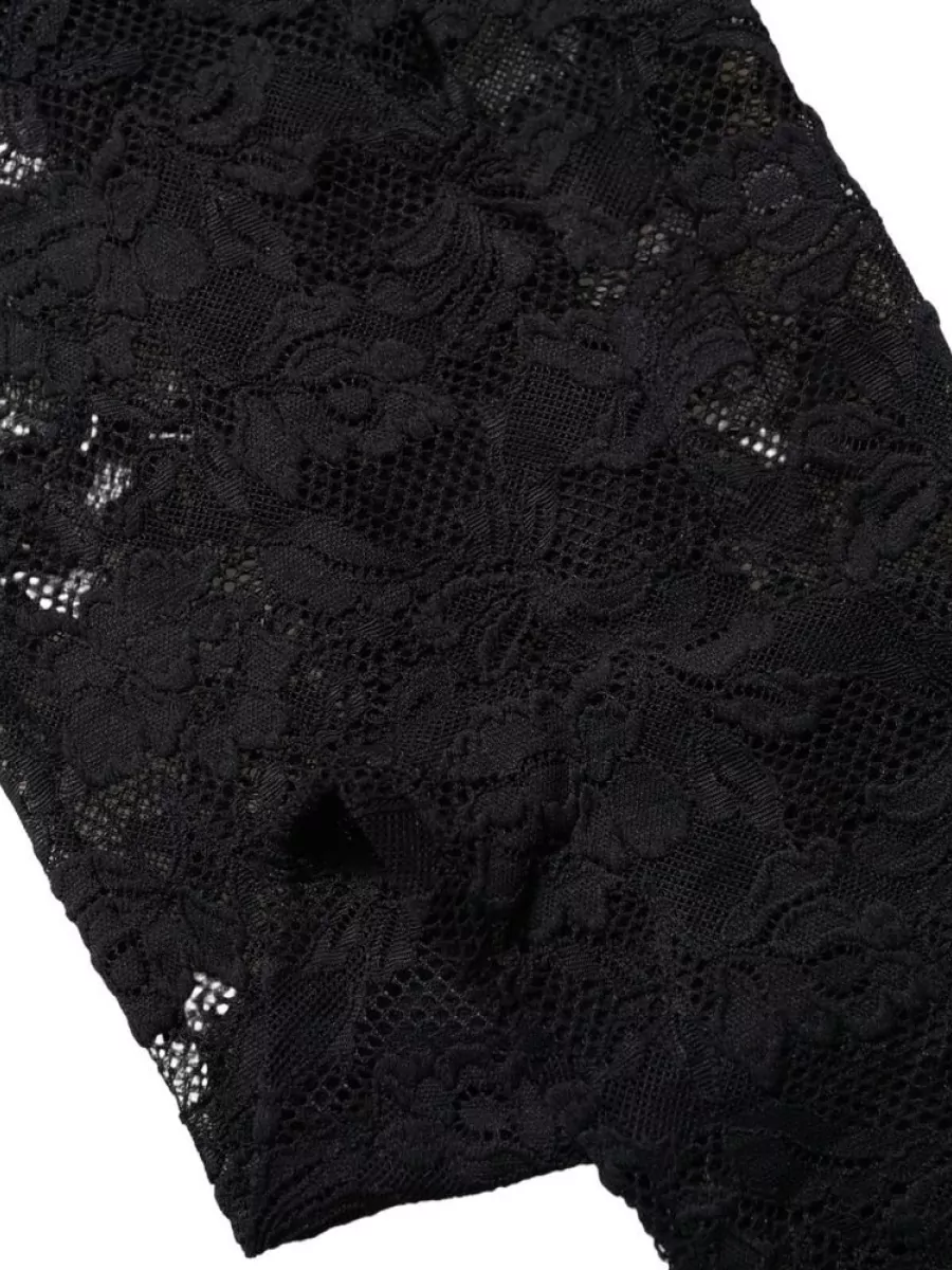 Dolce&Gabbana Floral lace thigh-high stockings — The sheer black lace thigh-highs continue the romantic mood while giving the mini length a subtly seductive finish that works for evening without breaking the refined palette.