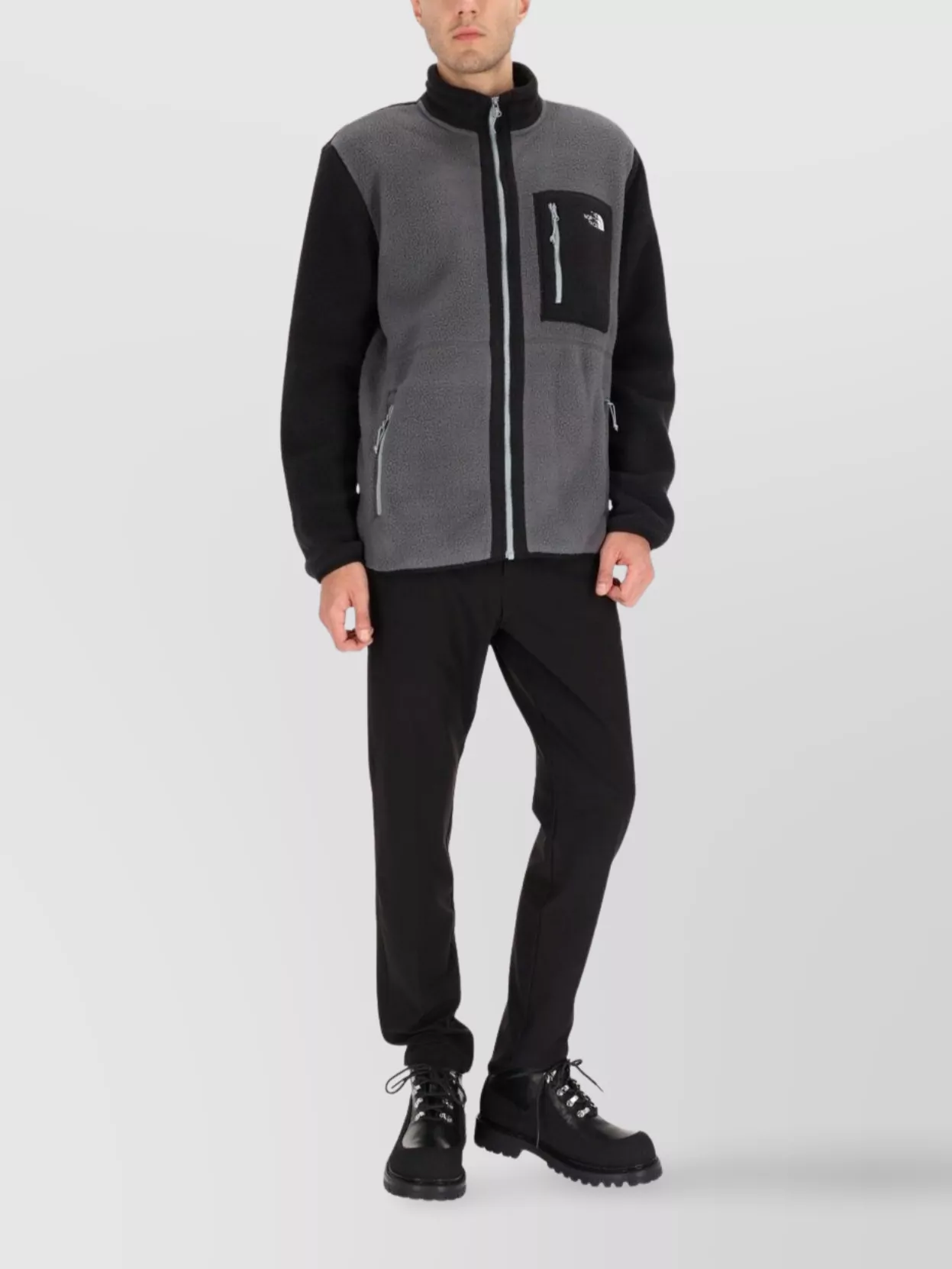 The North Face High Collar Jacket Featuring Multiple Pockets